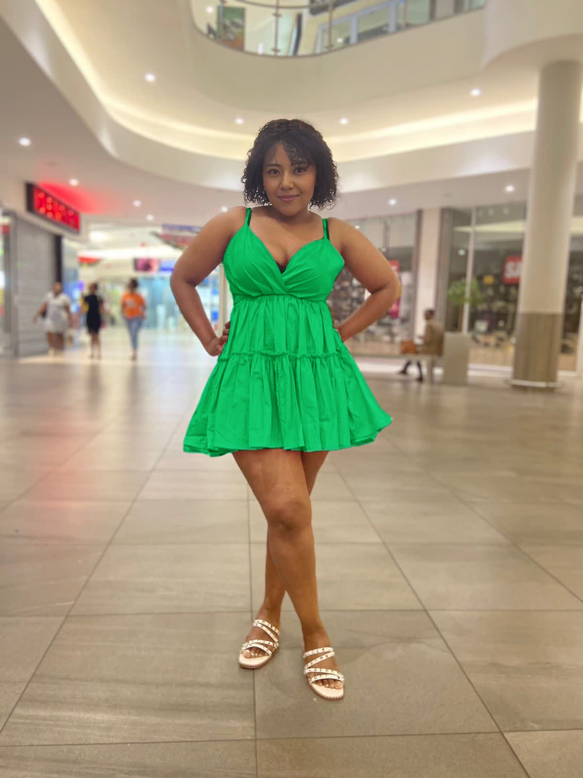 Green mini ruffle V-neck dress with thin straps and tiered flounce skirt