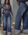Light wash high-waist wide-leg jeans with cuffed hems and pockets