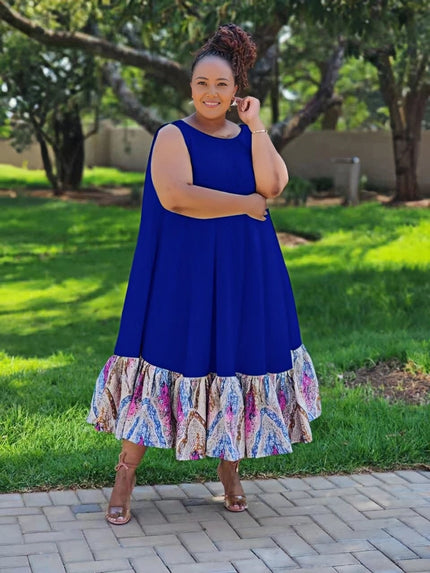 Plus-size sleeveless midi dress with ruffle hem; blue bodice, multicolor floral skirt