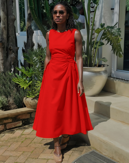 Red sleeveless midi dress with side ruching and adjustable waist tie