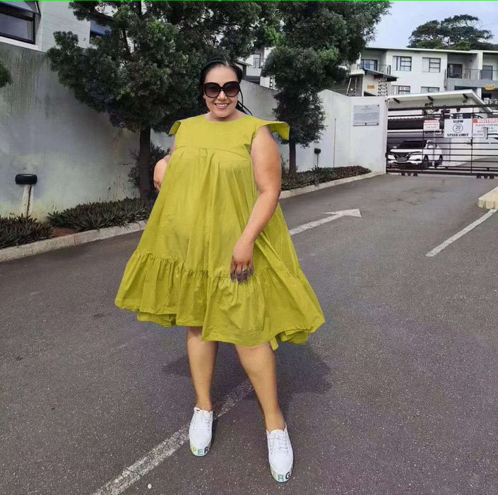 Yellow sleeveless A-line ruffle-hem dress with pleated bodice and tiered skirt