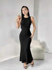 Sleeveless knitted maxi dress in black with ribbed texture and fitted silhouette