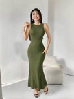 Sleeveless knitted maxi dress in army-green with ribbed texture and fitted column shape