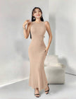 Sleeveless knitted maxi dress in nude with ribbed texture and fitted column shape