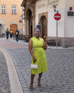 Neon yellow sleeveless midi utility dress with V-neck and front buttons