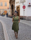 Army-green sleeveless midi utility dress with V-neck and front button placket