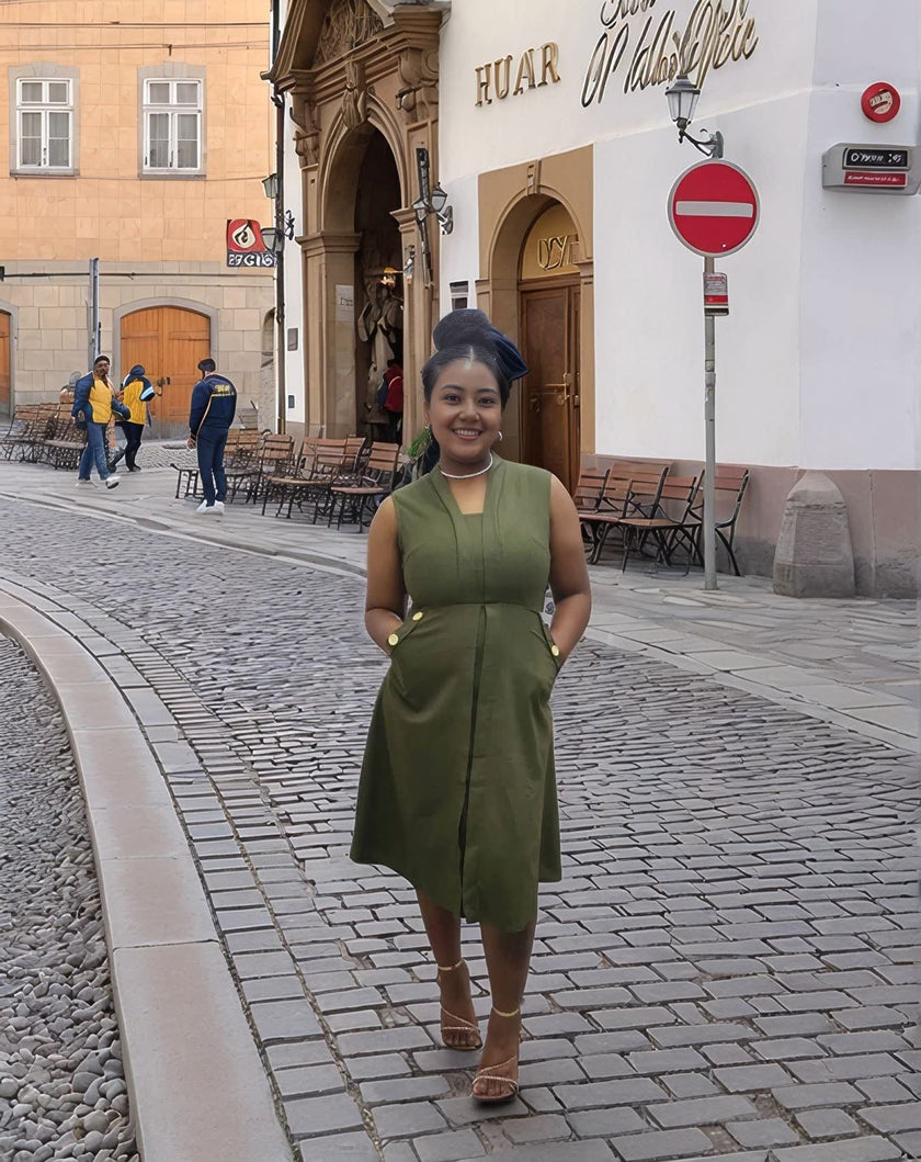 Army-green sleeveless midi utility dress with V-neck and front button placket