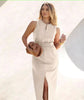 Light beige sleeveless midi dress with front slit, keyhole placket, and elastic waist