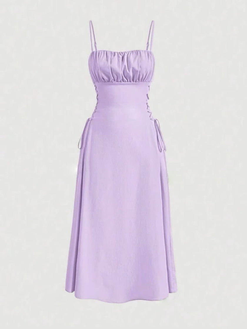 Lavender ruched midi dress with spaghetti straps and adjustable stretch waist