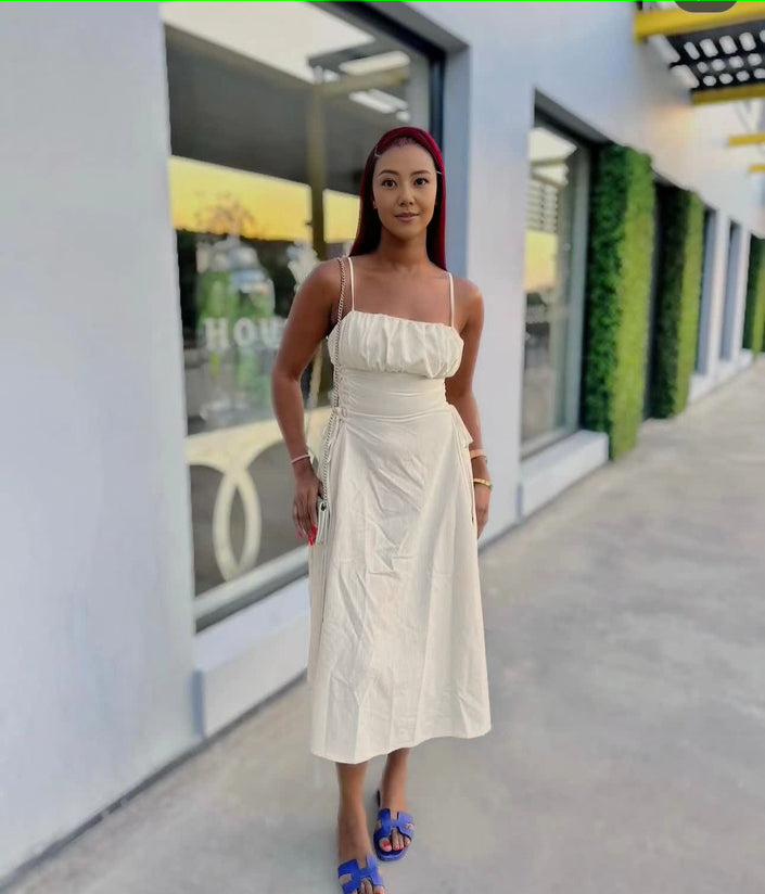 White ruched midi dress with spaghetti straps and adjustable stretch waist
