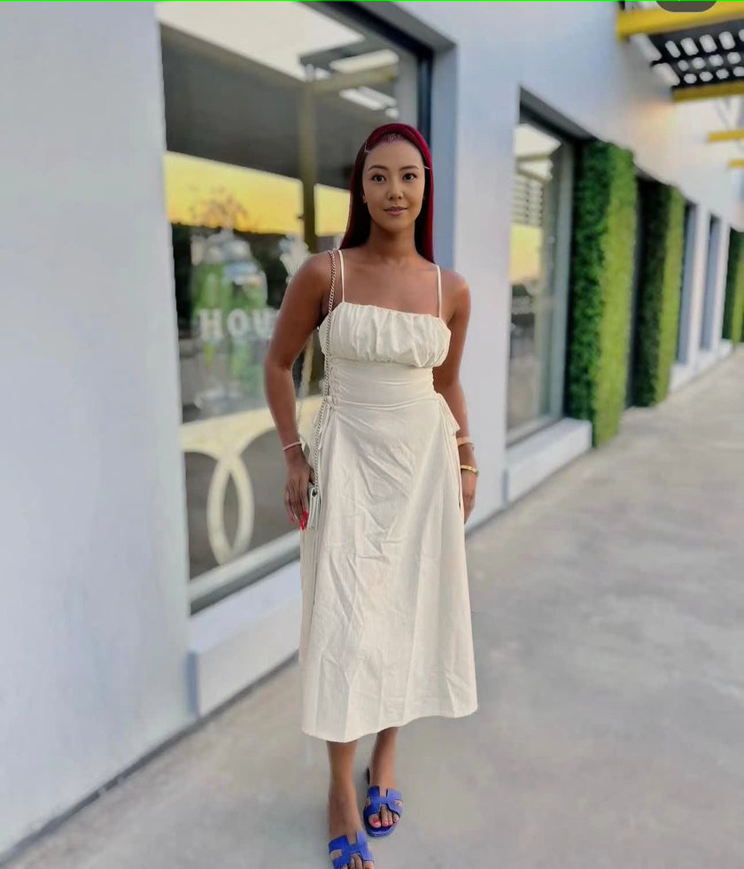 White ruched midi dress with spaghetti straps and adjustable stretch waist