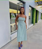 Light-blue ruched midi dress with spaghetti straps and adjustable stretch waist