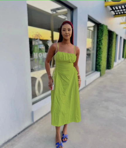 Lime-green ruched midi dress with spaghetti straps and adjustable stretch waist