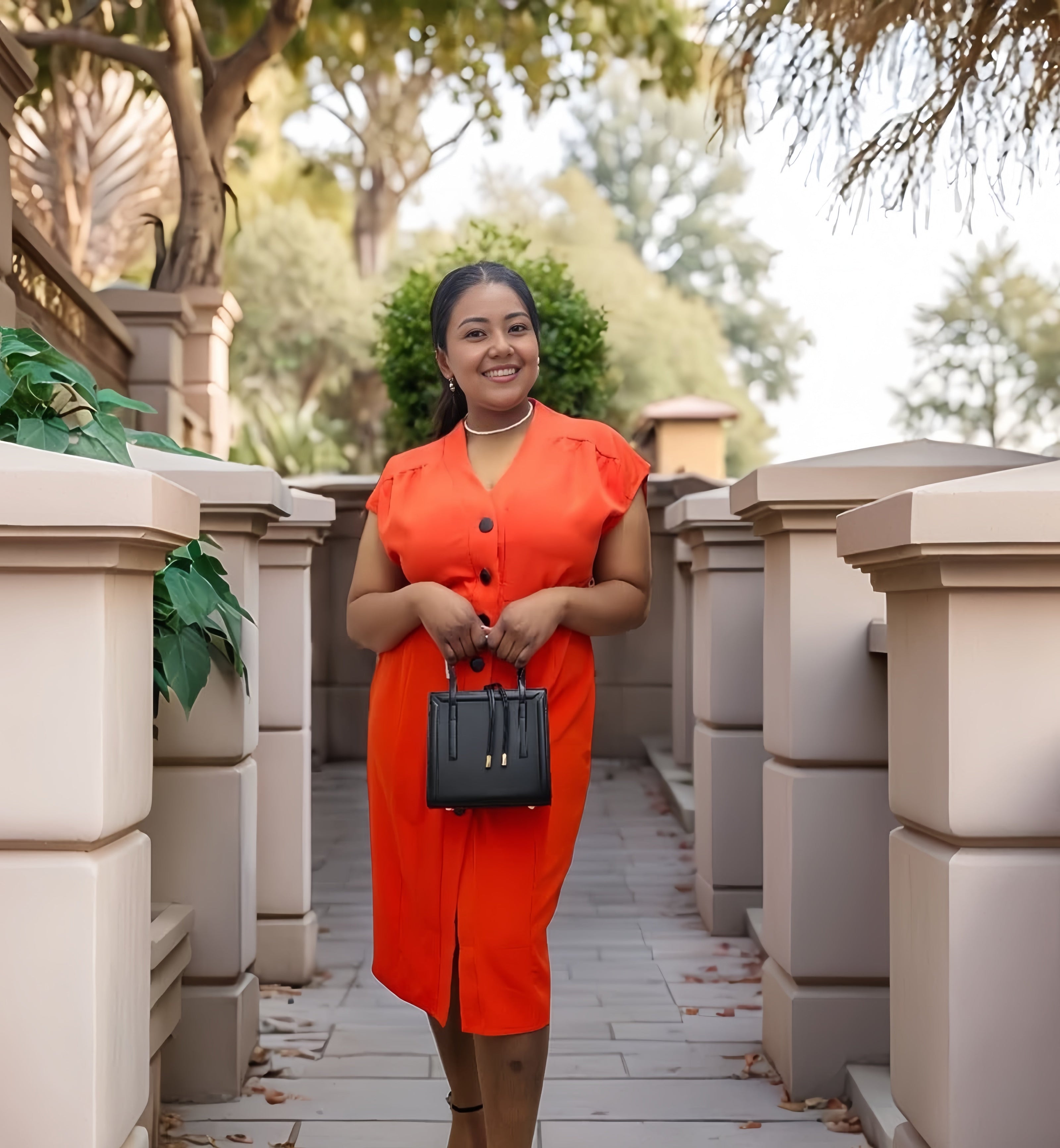 Orange V-neck button-front midi dress with short sleeves and center buttons