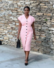 Light pink V-neck button-front midi dress with short sleeves and center button placket