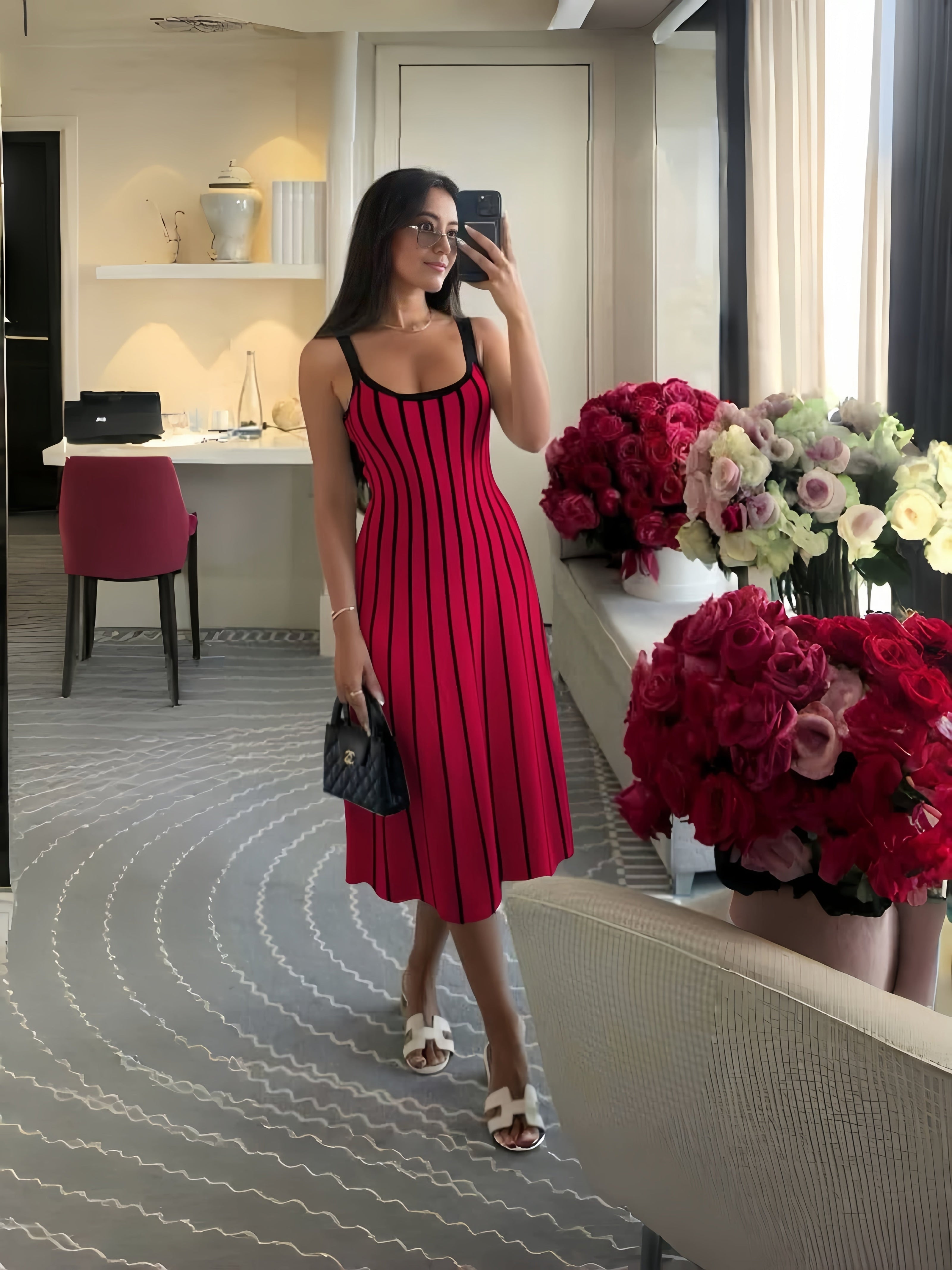 Knitted midi dress with red base and black vertical stripes, scoop neckline, thin straps
