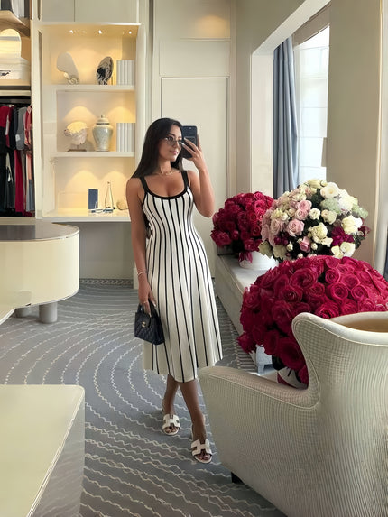 Knitted midi dress with black vertical stripes, scoop neckline and thin straps