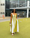 Sleeveless maxi dress with white vertical stripes over green paneling, wide scoop neck