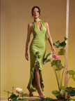 Green halter maxi dress with ruffle hem and rose appliqué at waist
