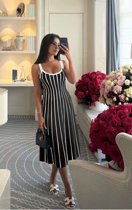 Knitted midi dress with black and white vertical stripes, scoop neckline and thin straps