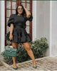 Black puff sleeve mini dress with tiered ruffle hem and gathered waist