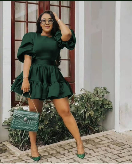 Dark green puff sleeve mini dress with gathered waist and tiered ruffle hem