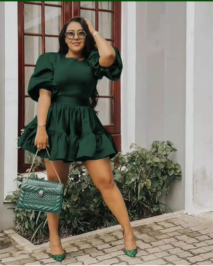 Dark green puff sleeve mini dress with gathered waist and tiered ruffle hem