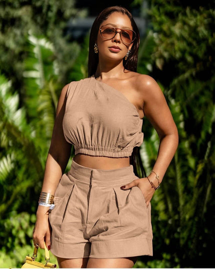 Nude off-shoulder crop top and pleated high-waist shorts set
