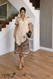 Palm print midi dress with collared short sleeves, beige with dark palm motifs.