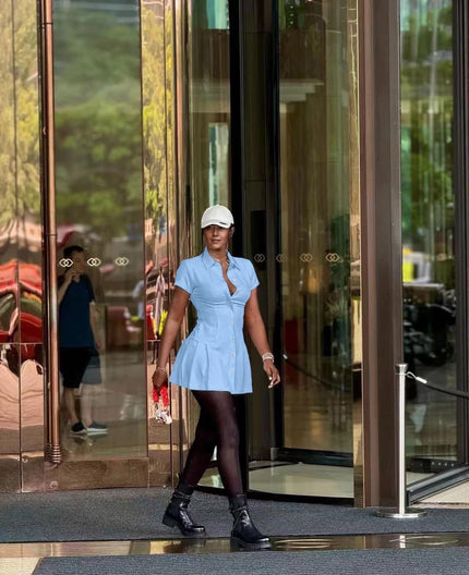 Sky-blue collared shirt dress with cinched waist and button front, mini length