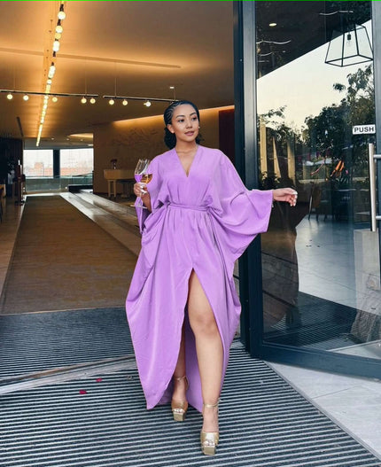 Light-purple loose-fit maxi dress with V-neck, long sleeves, waist tie, and front split hem