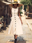Cream sleeveless midi button dress with flap pockets and peplum-style waist