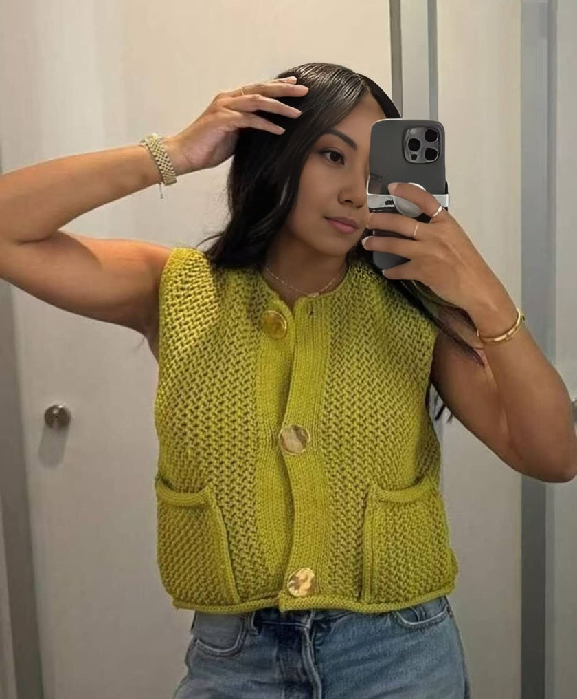 Yellow-green knit sleeveless vest with button front and two patch pockets