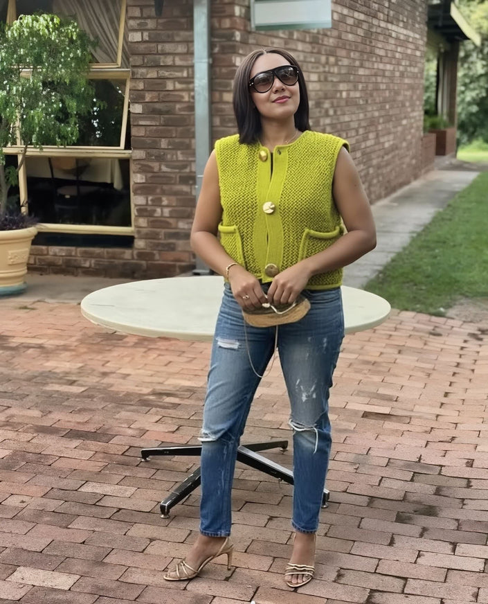 Yellow-green knit vest top with button front, V-neck, and two patch pockets