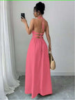 Pink halter midi dress with back cutout and flared skirt