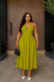 Yellow-green halter midi dress with V neckline and flared skirt