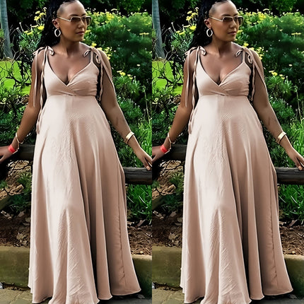 Peach maxi dress with tie shoulder straps and deep V-neck, adjustable fit