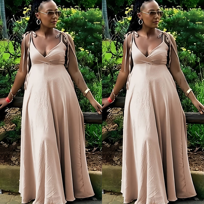 Peach maxi dress with tie shoulder straps and deep V-neck, adjustable fit