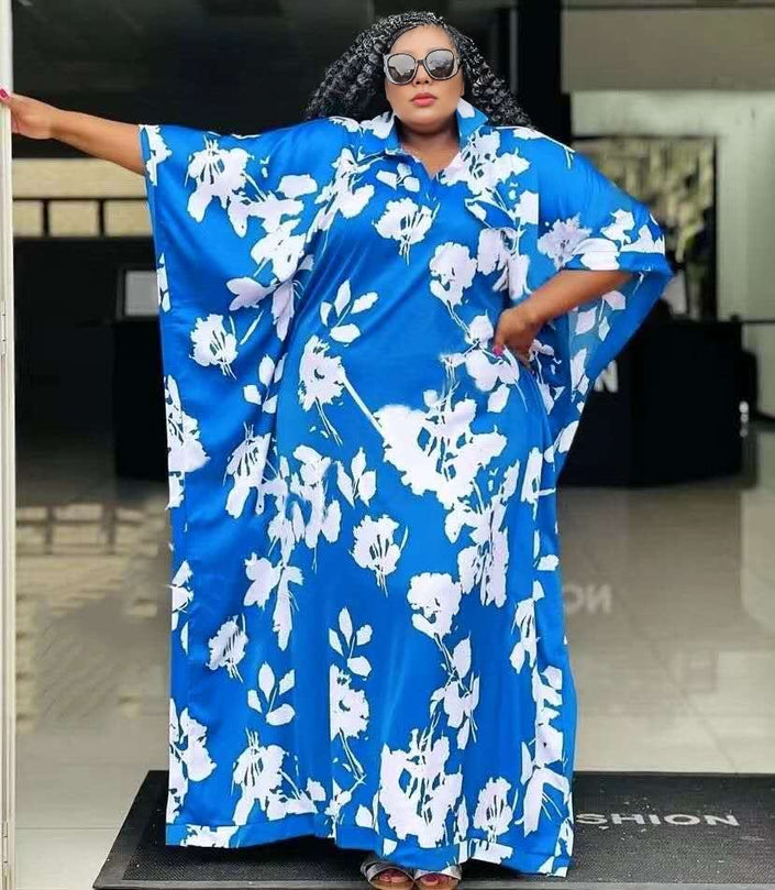 Blue floral maxi dress with white print, short sleeves, button-front, loose fit, plus size