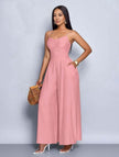 Pink pleated wide-leg jumpsuit with spaghetti straps and adjustable waist fit
