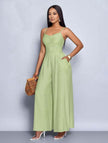 Mint-green pleated wide-leg jumpsuit with spaghetti straps and adjustable waist fit