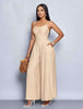 Beige pleated wide-leg jumpsuit with spaghetti straps and adjustable waist fit