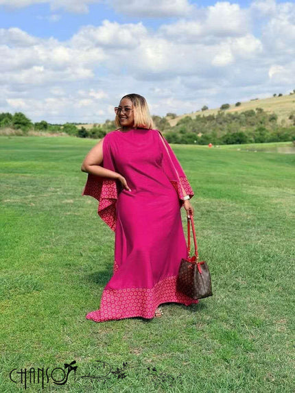 Fuchsia maxi dress with back view, flare sleeves and patterned patchwork hem