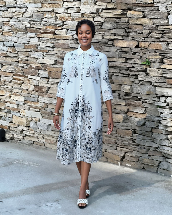 Plus size midi shirt dress in white with blue floral print, button-front, collared, 3/4 sleeves