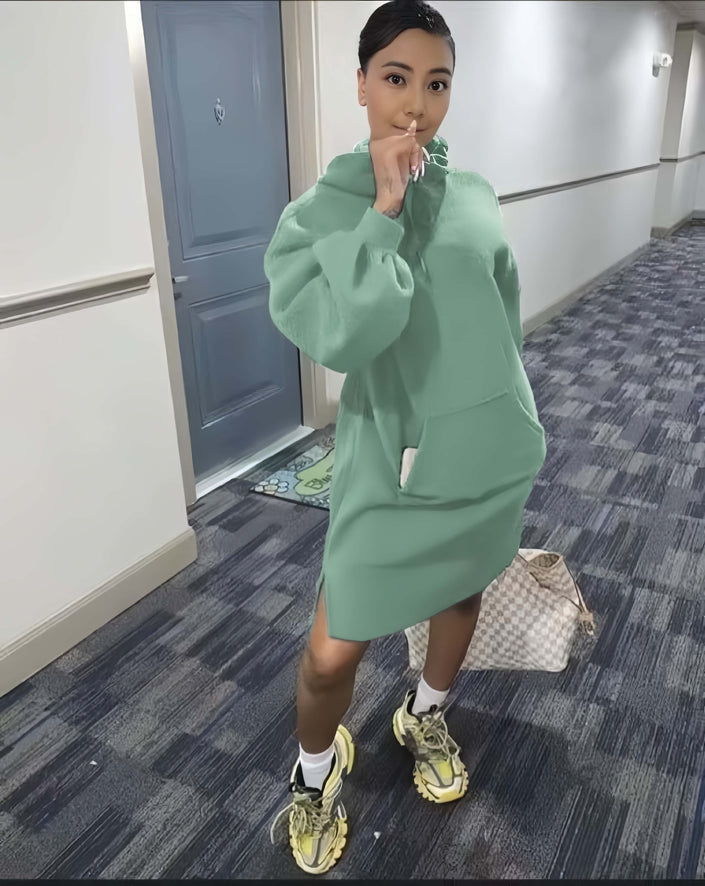 Mint green hoodie dress with relaxed fit, front pocket, and long sleeves