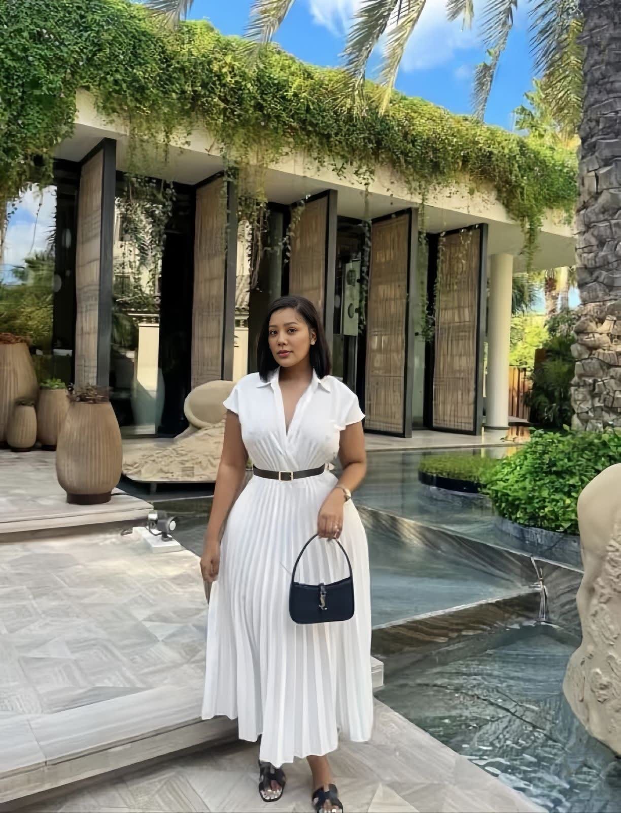 White pleated midi dress with belted waist and short sleeves