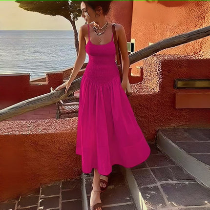 Deep-pink smocked bodice sleeveless dress with flared skirt and tiered pleats