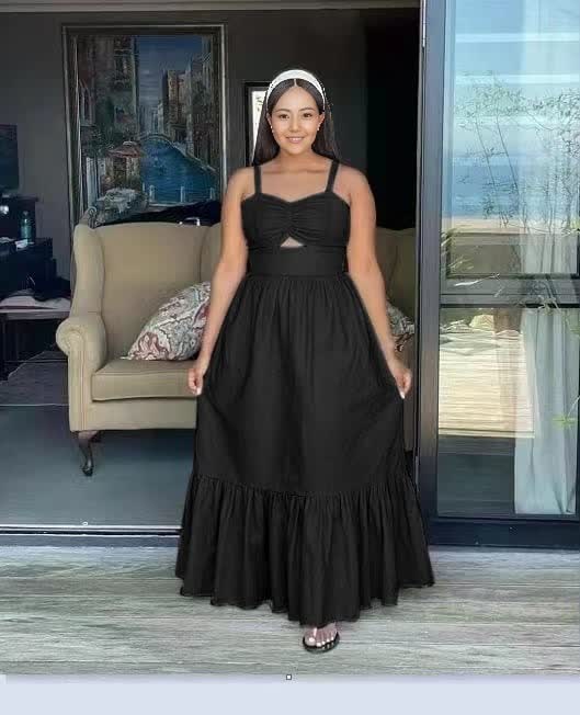 Black sleeveless maxi dress with bow at bust and tiered ruffle hem