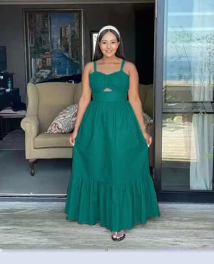 Teal sleeveless maxi dress with bow at bust and tiered ruffle hem