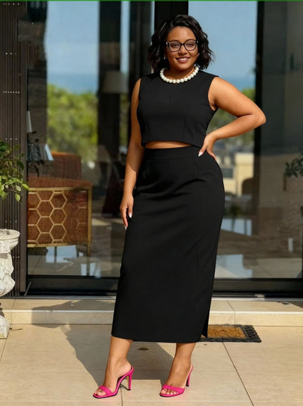 Black sleeveless cropped top and midi pencil skirt set with pearl collar necklace